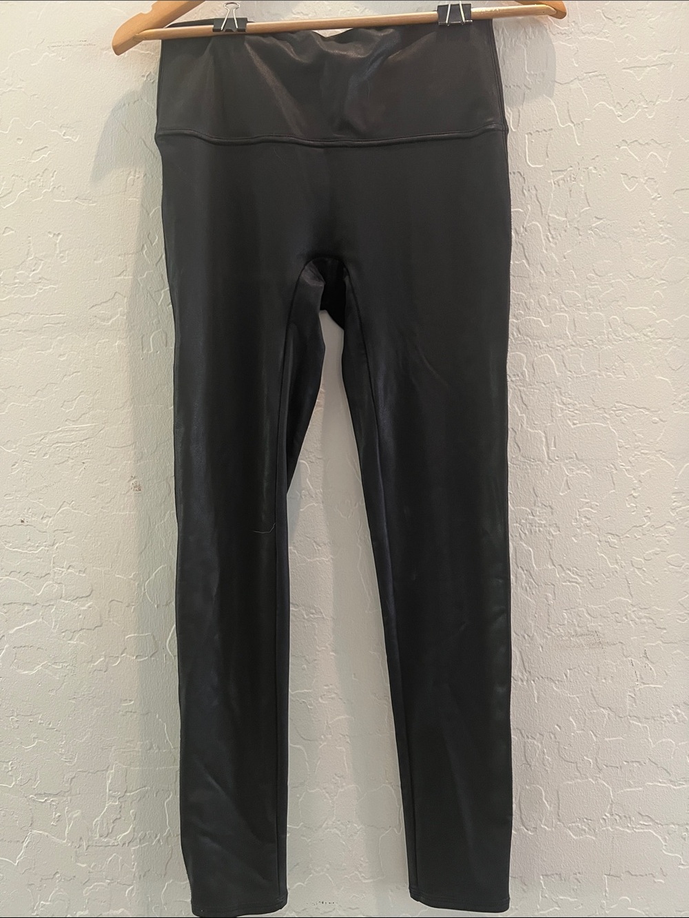 NWOT Black dressy leggings. Supportive fit. Faux leather finish.